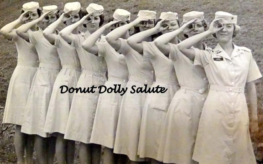 Nine women do the “Donut Dolly salute”.